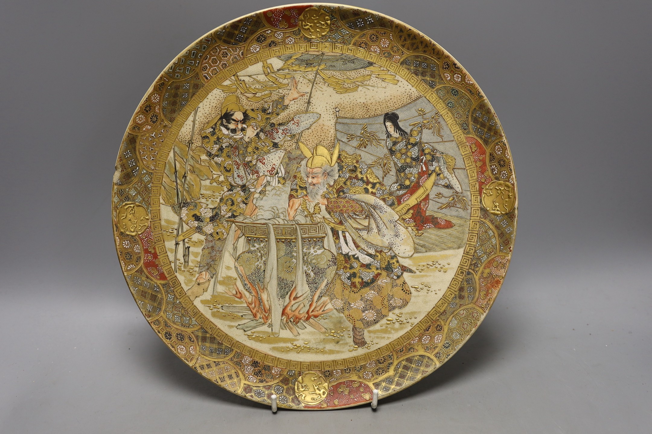 Three Japanese Satsuma dishes and a pair of plates - largest 31cm diameter